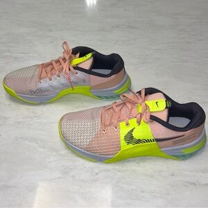 Women's Nike Metcon 8 training shoes in the Arctic Orange and Volt colorway.